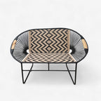 Sofa asiento y espaldar en rombo brazos de madera